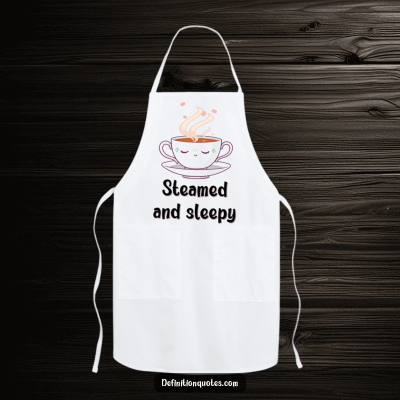 Funny Napping Teacup Apron: Kitchen apron featuring a cute napping teacup amidst a swirling steam cloud, perfect for a funny, relaxing cooking experience.