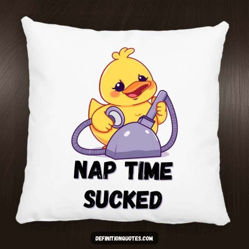 Funny terrified smiling rubber ducky powering a giant vacuum cleaner, on a soft decorative pillow.