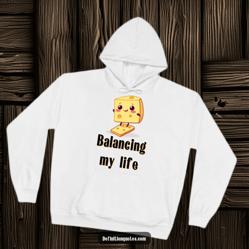 Funny, cozy hoodie featuring a giggling cheese wedge struggling to maintain balance on a single, shaky cracker.