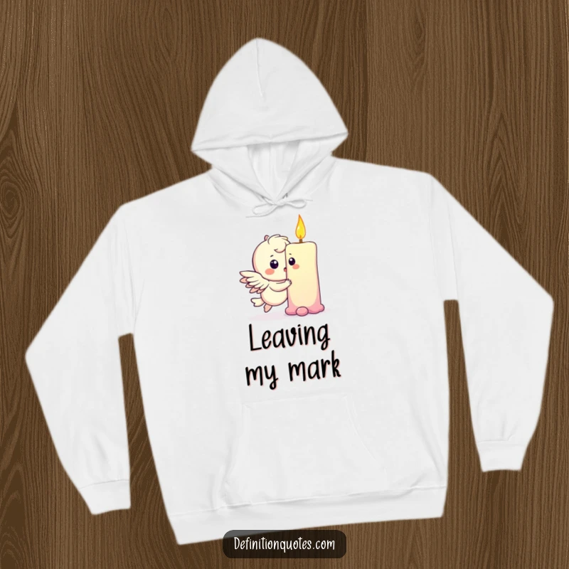 Funny hoodie featuring a playful winged character bumping into a rainbow, leaving a small dent, cozy and magical.