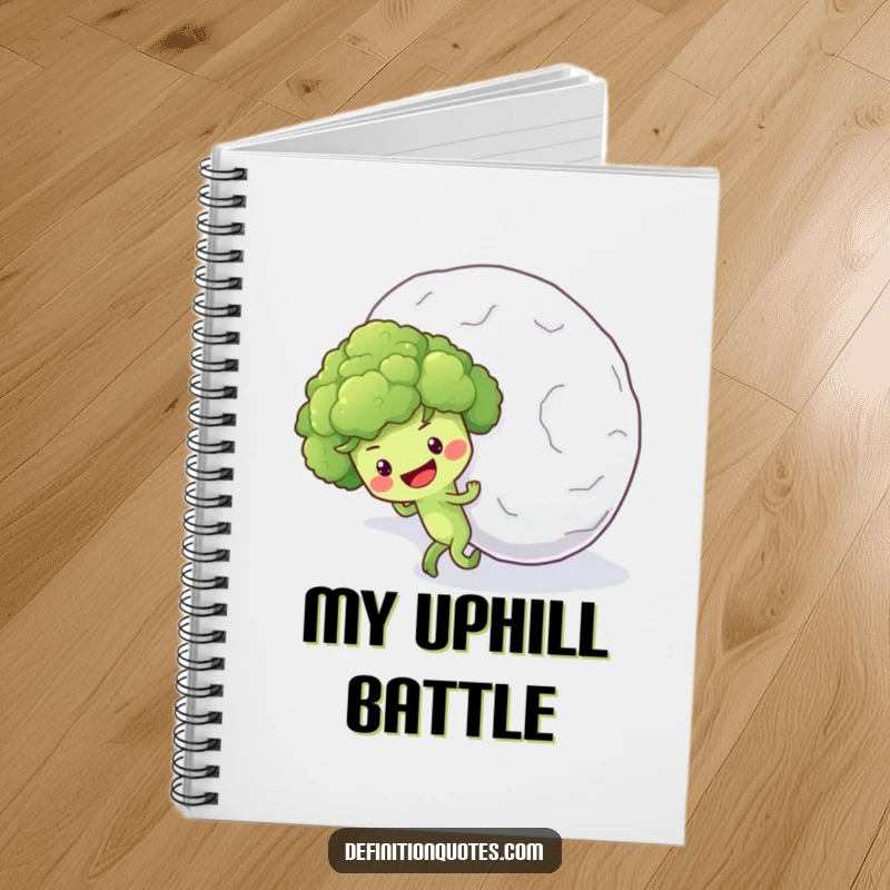 Funny notebook cover with an optimistic broccoli floret character pushing a massive snowball uphill, ready for notes.