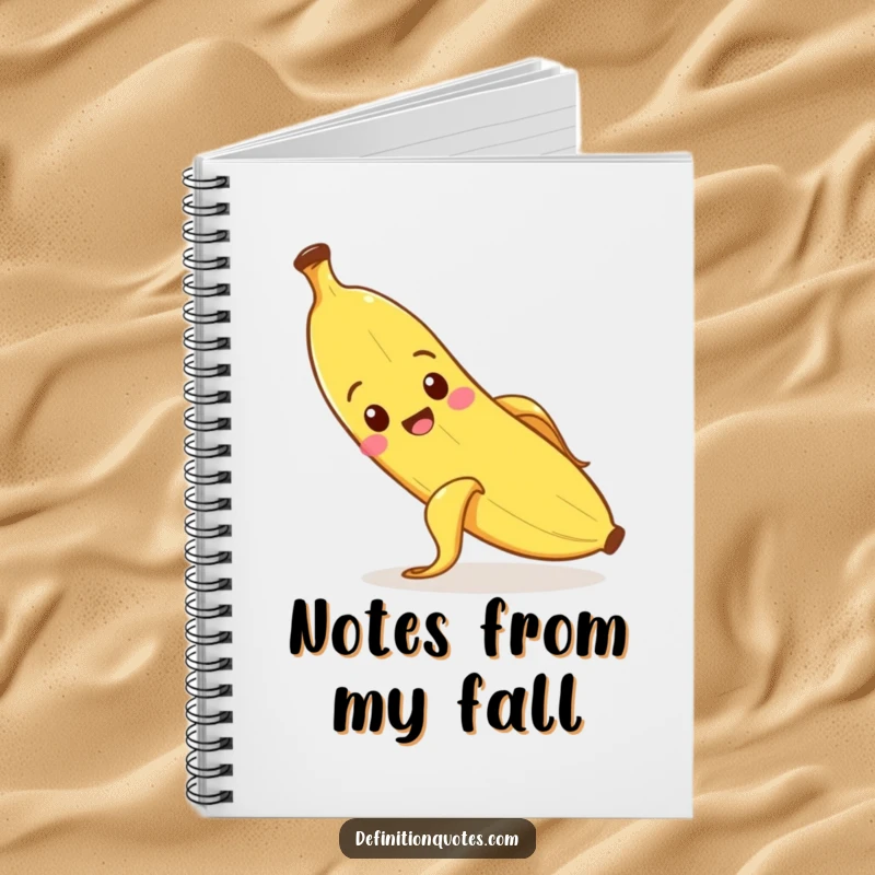 Funny banana character slipping on its peel, writing in a notebook.