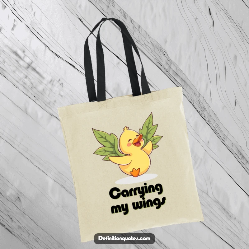 Funny rubber duck with mismatched leaf wings, attempting to fly, on a durable tote bag for a humorous touch.
