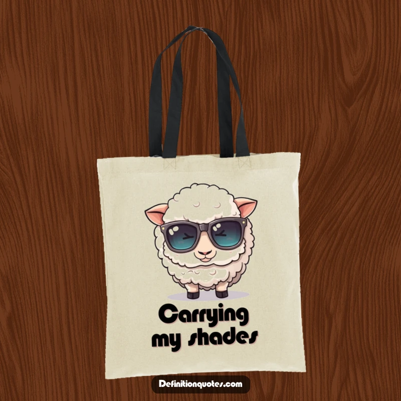 Funny tote bag: A cute, fluffy sheep character comically struggles to wear oversized sunglasses, ready for any outing.